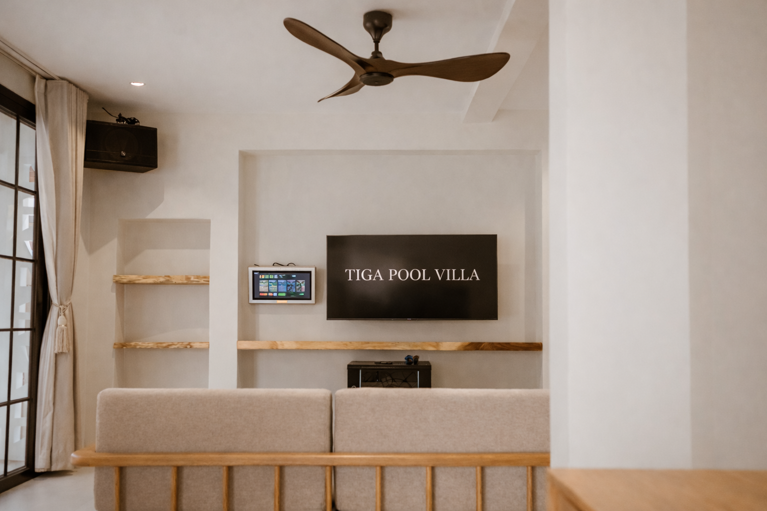 A living room with a TV.